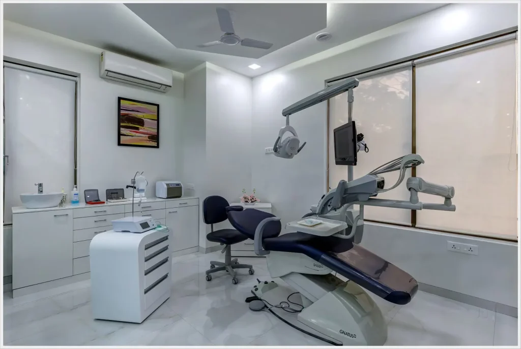 A state-of-the-art treatment room at the best dental clinic in Chennai featuring a high-tech dental chair, digital monitors, and a sterile clinical environment for patient care.