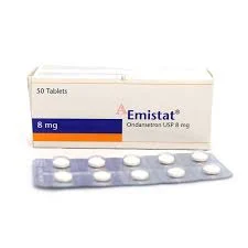 A front-facing view of a white Emistat 8 mg tablet box with a blue and orange stripe, with a single clear blister pack in the foreground displaying ten round white tablets.