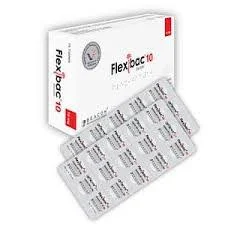 A white commercial cardboard box of Flexibac 10 tablets with red accents, positioned behind two overlapping silver foil blister strips displaying rows of pills.