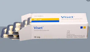 A horizontal view of a white cardboard box for Viset 50 mg tablets, with multiple silver blister strips containing round, yellowish pills partially pulled out from the left opening side.
